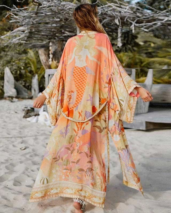 Kimono long imprimé sirène et floral. Kimono bohème parfait pour la plage. Découvrez notre collection de kimonos uniques!