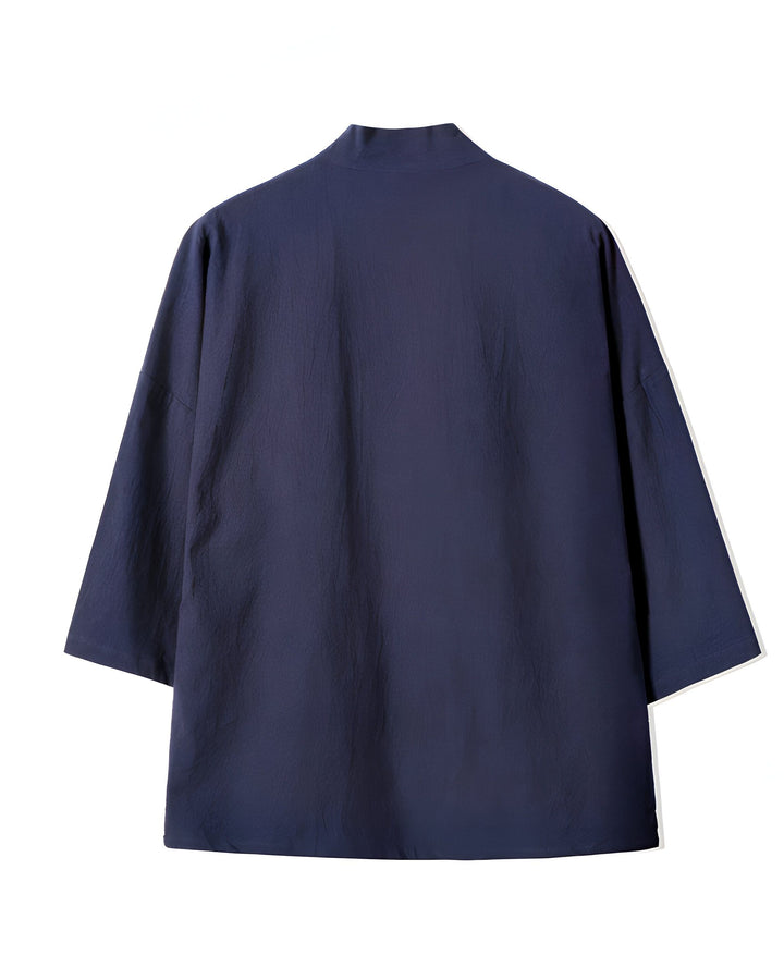 Kimono bleu marine unisexe. Vêtement japonais traditionnel, idéal pour un look décontracté ou élégant. Découvrez notre collection de kimonos uniques.