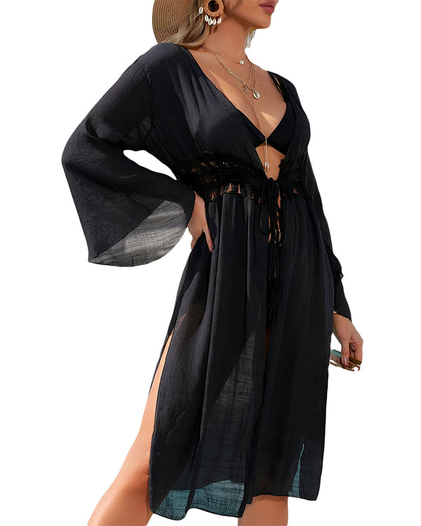 Kimono noir long pour femme, idéal comme vêtement de plage ou de détente. Style bohème avec détails ajourés et fentes latérales. Découvrez notre collection de kimonos tendance.