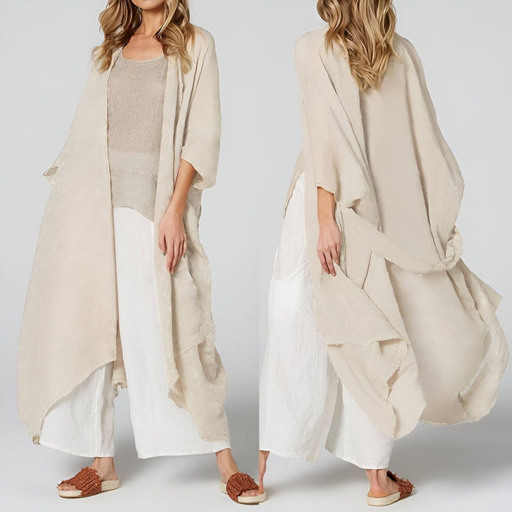 Kimono beige long pour femme, style décontracté. Vêtement d'extérieur ample en lin, idéal pour un look bohème chic. Vente de kimonos en ligne.