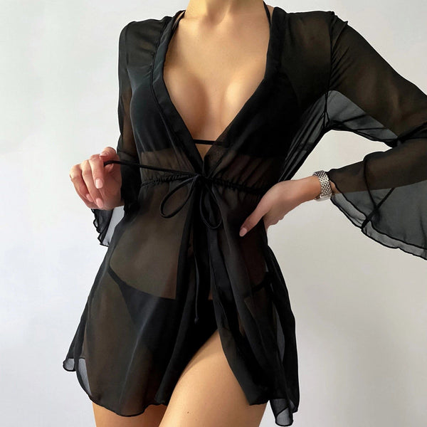 Kimono noir transparent pour femme. Vêtements de plage élégants. Disponible dans notre boutique en ligne.