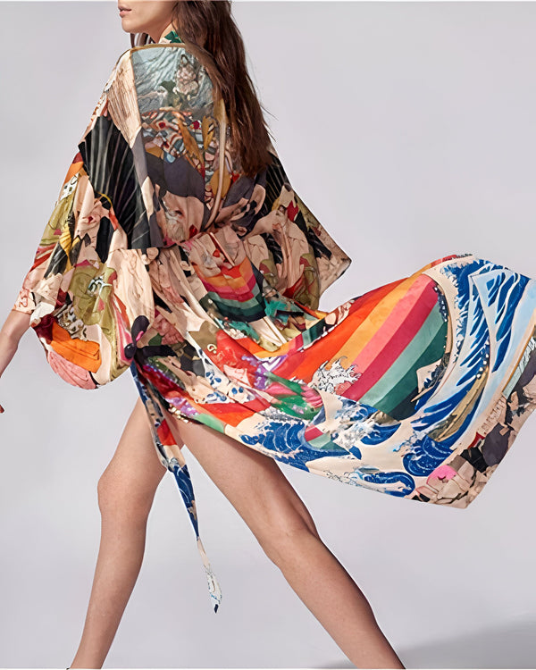 Kimono imprimé multicolore pour femme. Motifs inspirés de l'art japonais traditionnel. Vêtement ample et confortable, idéal pour un style unique. Découvrez notre collection de kimonos originaux.