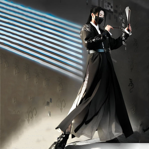 Homme portant un kimono noir avec masque, tenant un éventail et un pinceau. Vêtements traditionnels japonais. Boutique de kimonos.