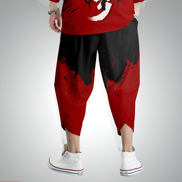 Pantalon kimono homme noir et rouge avec motif éclaboussures. Idéal pour un look japonais moderne et décontracté. Découvrez notre collection de vêtements kimono originaux.