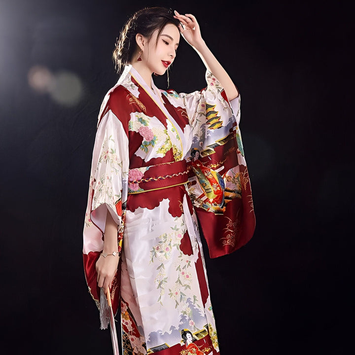 Femme portant un kimono japonais traditionnel rouge et blanc. Détails complexes et motifs floraux. Idéal pour votre collection de kimonos uniques.