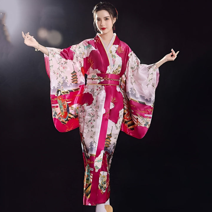 Femme portant un kimono rose à motifs floraux et de pagodes. Kimono traditionnel japonais à vendre.