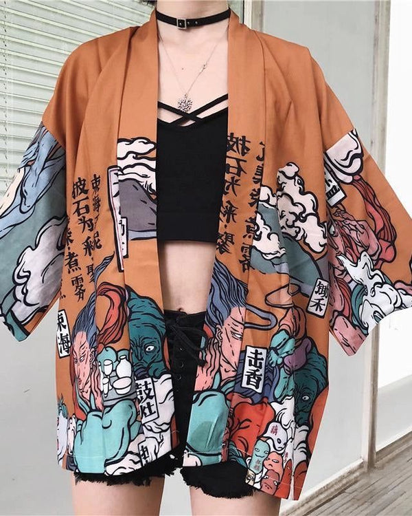 Kimono orange avec motifs japonais colorés. Vêtements traditionnels revisités pour un style unique. Découvrez notre collection de kimonos pour hommes et femmes. Mode japonaise authentique.