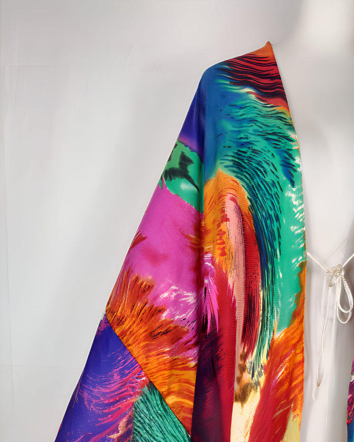 Kimono coloré avec motifs abstraits, parfait pour un style unique et tendance. Découvrez notre collection de kimonos de haute qualité.