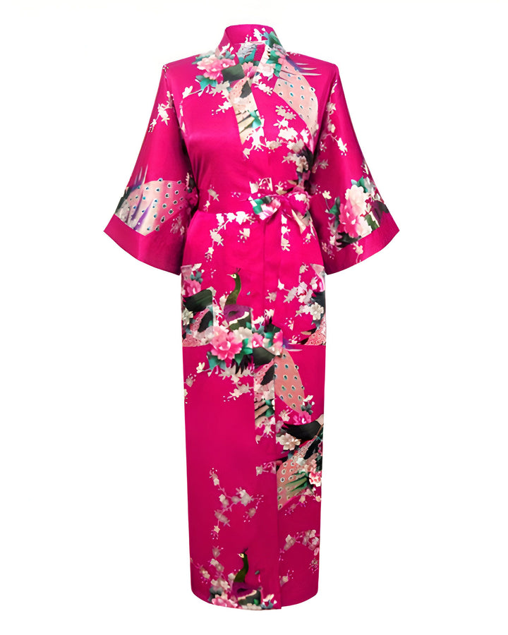 Kimono rose vif avec motifs de paons et fleurs. Vêtement traditionnel japonais élégant et confortable. Idéal pour se détendre à la maison ou pour une occasion spéciale. Découvrez notre collection de kimonos uniques.