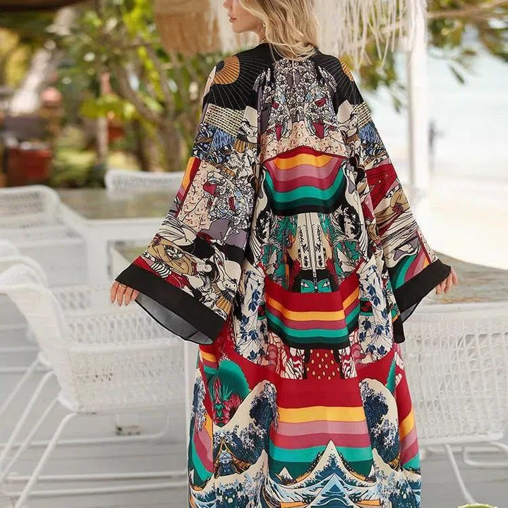 Kimono multicolore à motifs artistiques porté par une femme. Vêtement ample et élégant, idéal pour la plage ou la détente. Découvrez notre collection de kimonos uniques.
