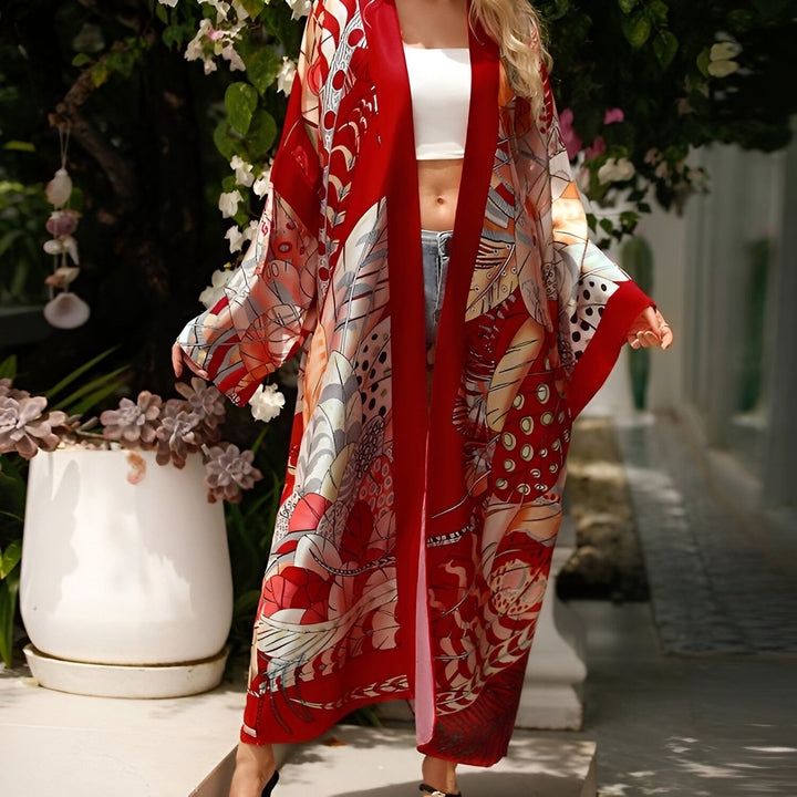 Kimono rouge à motifs, idéal pour un look bohème chic. Vêtements style japonais pour femme. Découvrez notre collection de kimonos élégants et confortables.