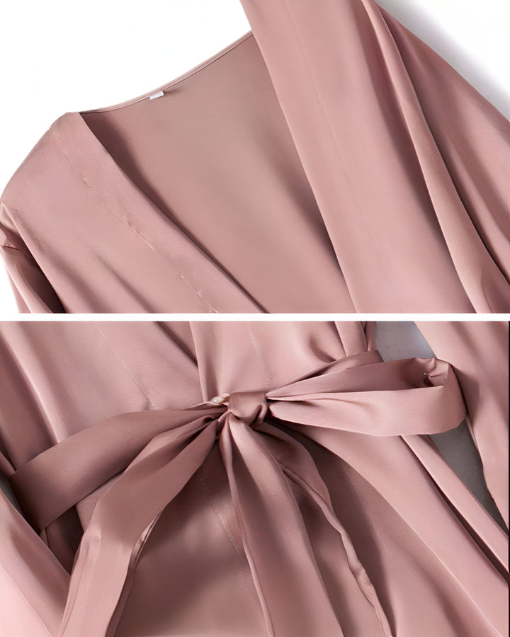 Détail d'un kimono rose poudré en soie avec une ceinture nouée. Vêtements japonais traditionnels. Kimonos à vendre.