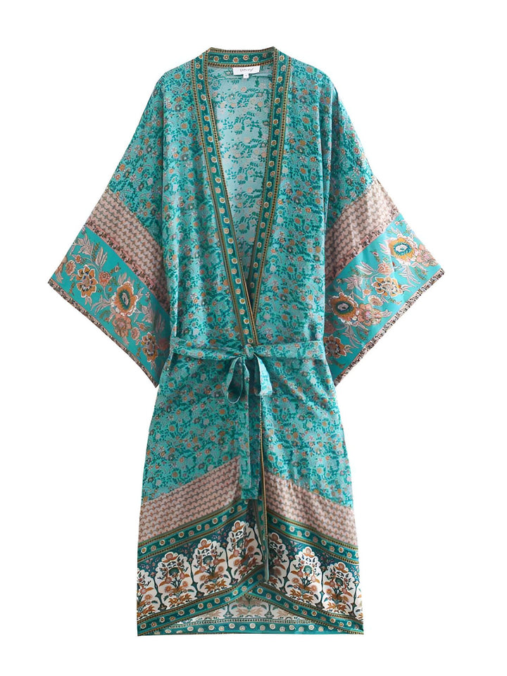 Kimono turquoise à motifs floraux, ceinture nouée. Vêtement d'extérieur léger et élégant. Idéal pour la superposition et un style bohème chic.