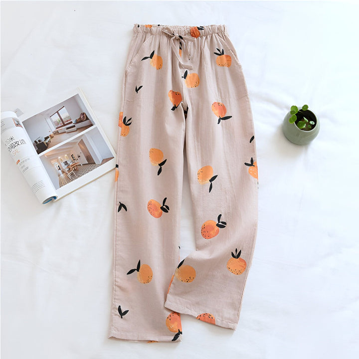 Pantalon de kimono décontracté avec motif d'oranges. Idéal pour la détente à la maison ou un style confortable et unique. Découvrez notre collection de kimonos et vêtements d'intérieur originaux.