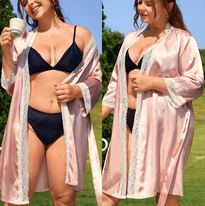 Femme portant un kimono rose en satin avec garniture en dentelle. Kimonos élégants à vendre.