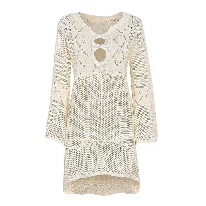 Kimono ajouré beige à manches longues avec découpes et cordon de serrage. Vêtement d'été idéal comme couvre-maillot. Découvrez notre collection de kimonos uniques.