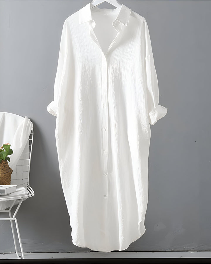 Kimono chemise blanche longue pour femme, style décontracté et élégant. Vêtement ample et confortable, parfait pour un look moderne. Idéal pour compléter votre garde-robe kimono.