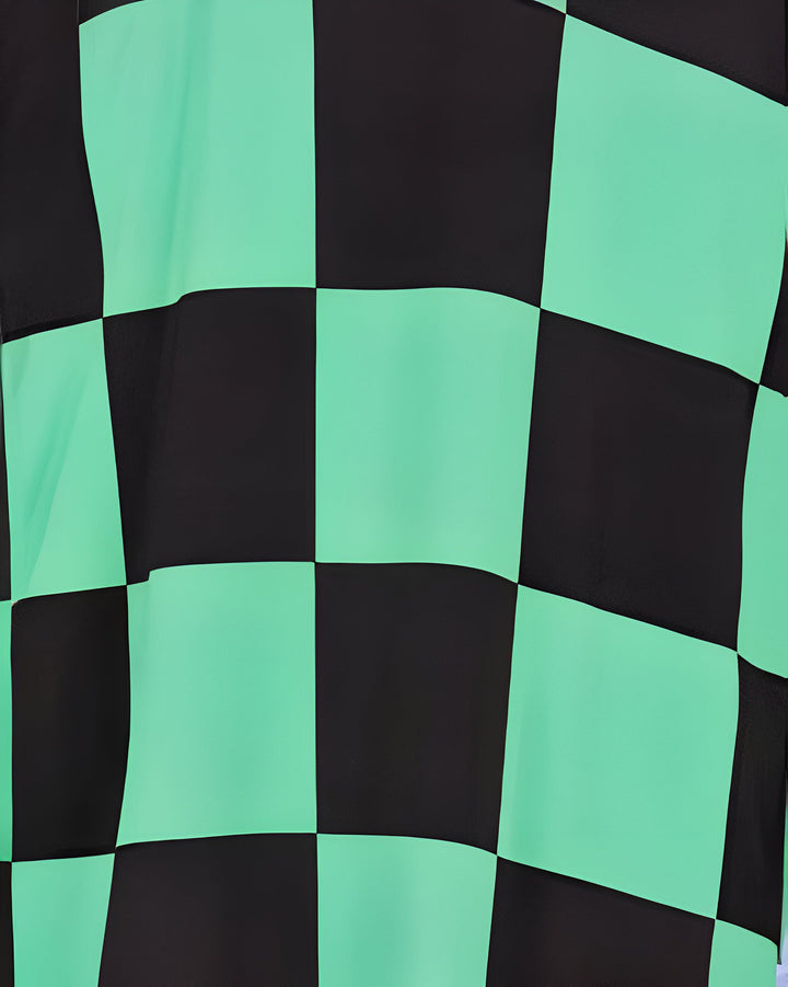 Motif à carreaux noirs et vert d'eau sur un kimono. Détail du tissu d'un kimono traditionnel japonais. Vêtements japonais à vendre.