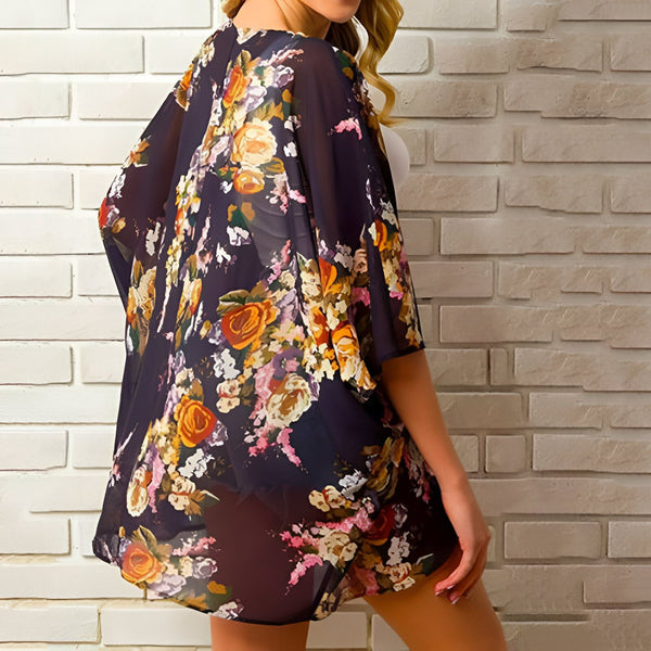 Kimono fleuri pour femme. Vêtement léger et élégant avec motifs floraux. Idéal pour la plage ou comme accessoire de mode. Découvrez notre collection de kimonos.