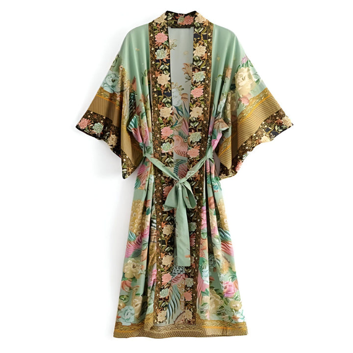 Kimono femme à motifs floraux sur fond vert. Vêtement d'intérieur élégant avec ceinture. Idéal pour se détendre avec style. Découvrez notre collection de kimonos uniques.